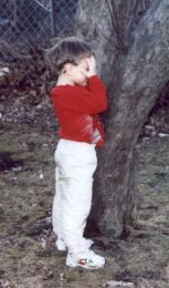 boy playing hide and seek