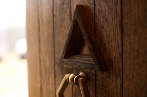 Pyramid window and door knocker. Photo by Phil Franta.